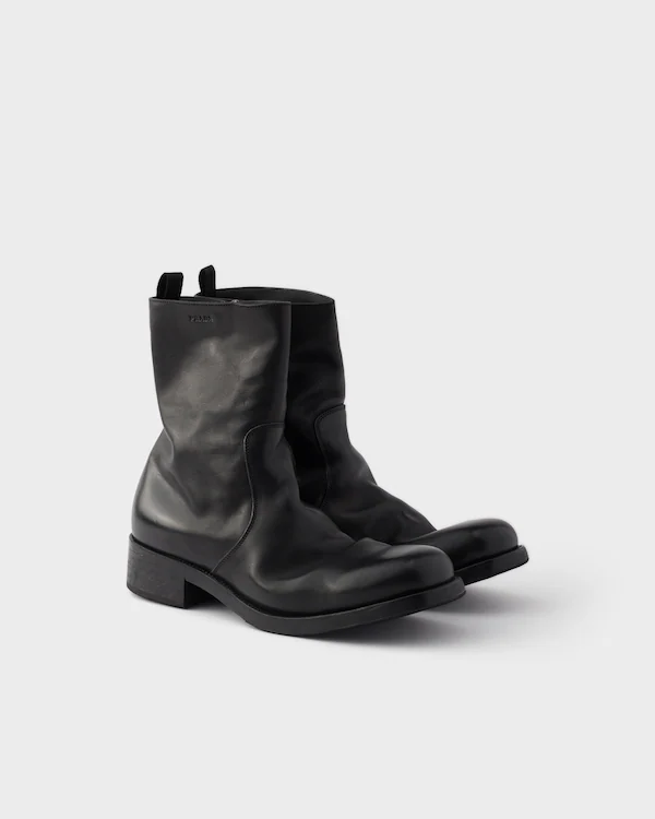 Botas de couro com zíper